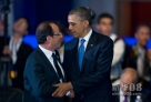 6月18日，美国总统奥巴马（右）在墨西哥洛斯卡沃斯举行的二十国集团领导人第七次峰会开幕式前与法国总统奥朗德交谈。新华社发（戴维 摄）