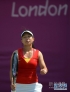 7月30日，郑洁在比赛失利后。当日，在伦敦奥运会网球女单第一轮比赛中，中国选手郑洁以0比2不敌俄罗斯选手佩特洛娃，无缘下一轮。新华社记者陶希夷摄