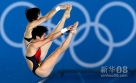 7月31日，在伦敦奥运会女子双人10米跳台跳水决赛中，中国组合陈若琳/汪皓（上）以368.40分的总成绩夺冠。新华社记者凡军摄