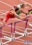 8月7日，刘翔在比赛中打栏瞬间。当日，中国选手刘翔在伦敦奥运会田径男子110米栏预赛中摔倒，无缘晋级。 新华社记者费茂华摄