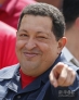 10月7日，在委内瑞拉首都加拉加斯，委内瑞拉总统查韦斯投票后向支持者致意。
    当日，委内瑞拉全国选举委员会宣布，现任总统查韦斯以54%的得票率赢得委内瑞拉总统选举。 
    新华社/路透  