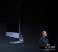 10月23日，苹果公司全球市场营销高级副总裁菲尔·席勒在美国圣何塞举行的新品发布会上介绍新款iMac。新华社发