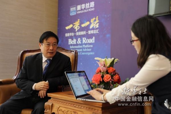 微信图片图为亚洲金融合作协会秘书长杨再平接受新华丝路记者采访 毛丽丽摄