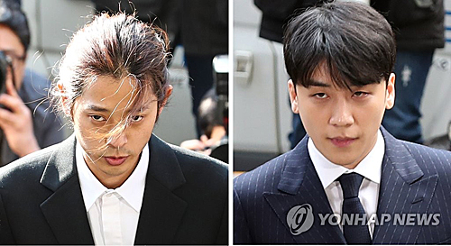 涉嫌偷拍和散播不雅照片的韩流明星胜利（右）和郑俊英（韩联社）jpg